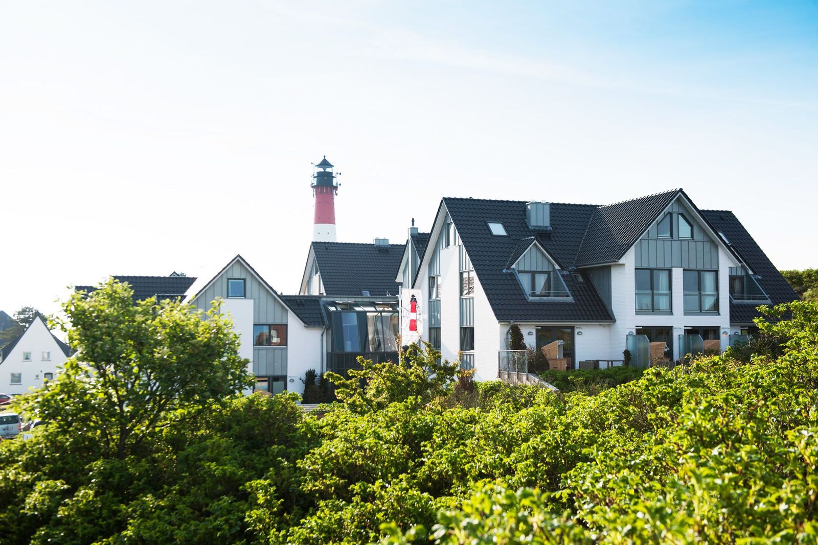 Apartmenthotel am Hörnum Leuchtturm im Hintergrund in Sylt